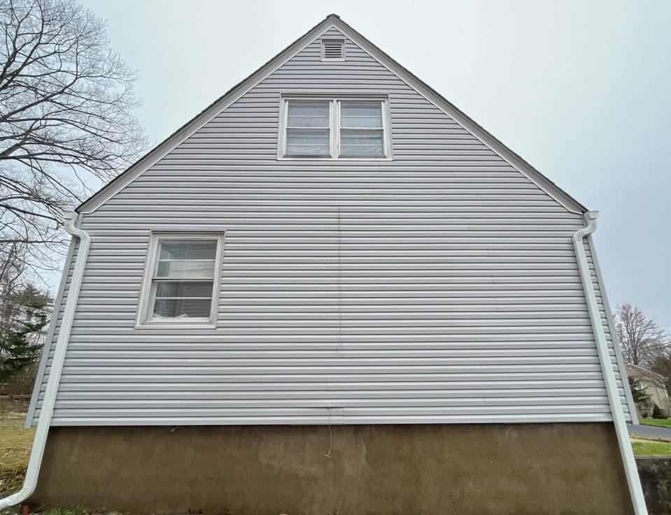 Cleveland Heights Power Washing technician performing detailed house washing in Cleveland Heights residential area